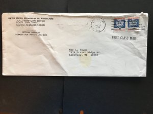 1990 Business Envelope franked with a coil pair of 25-cent official stamps O141