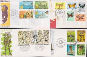 PAPUA NEW GUINEA 1979-85 4 commem sets on FDCs.............................B1144