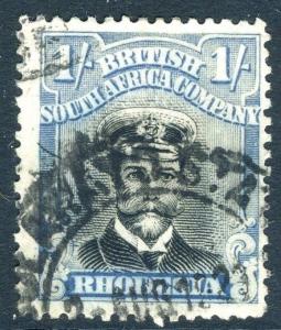 RHODESIA-1919 1/- Black & Light Blue Sg 272a GOOD USED V18594