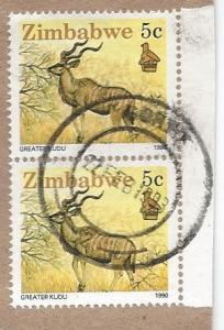 Zimbabwe 618 (used pair on paper) 5c greater kudu (1990)