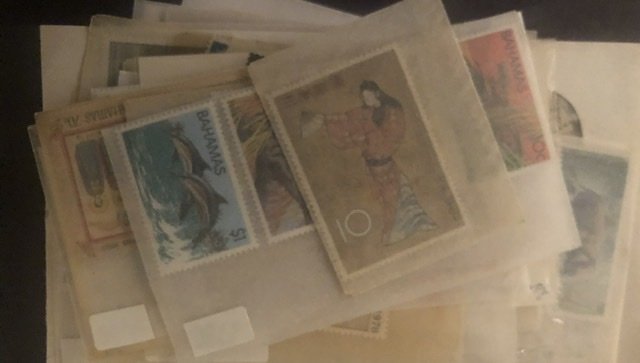 Lot of International Stamps In Glass Scenes Some Have Nice Value