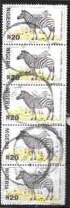 Nigeria #732 used strip of 5  Zebra.