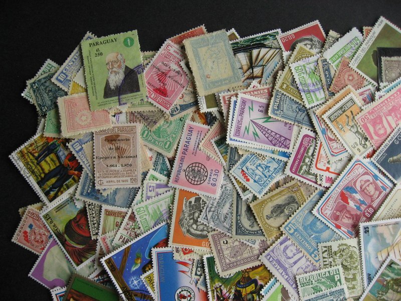 Paraguay scrap pile (duplicates, mixed cond) estimate 350 stamps