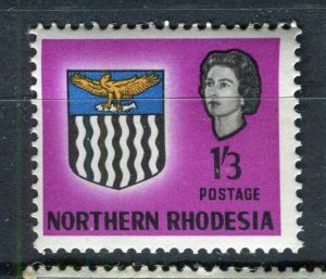 RHODESIA; NORTHERN 1963 early QEII COST OF ARMS issue mint hinged 1s.3d. value