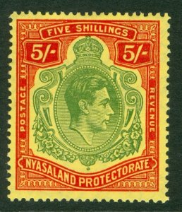 SG 141a Nyasaland 1938-44. 5/- green & red/pale yellow. Very lightly mounted...