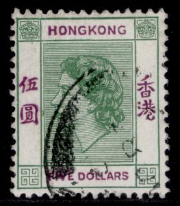 HONG KONG QEII SG190a, $5 yellowish green & purple, FINE USED. Cat £11.