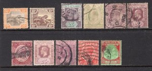 Malaya & Straits Settlements Group of 11 Old Stamps Used or Mint CV$85