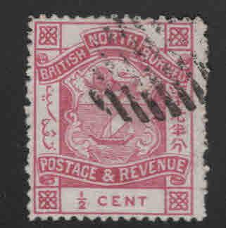 North Borneo Scott 35 used 1887 perf 14, coat of arms stamps