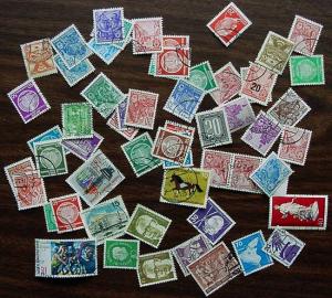 Packet, Berlin & DDR, about 55 Used stamps, mostly DDR