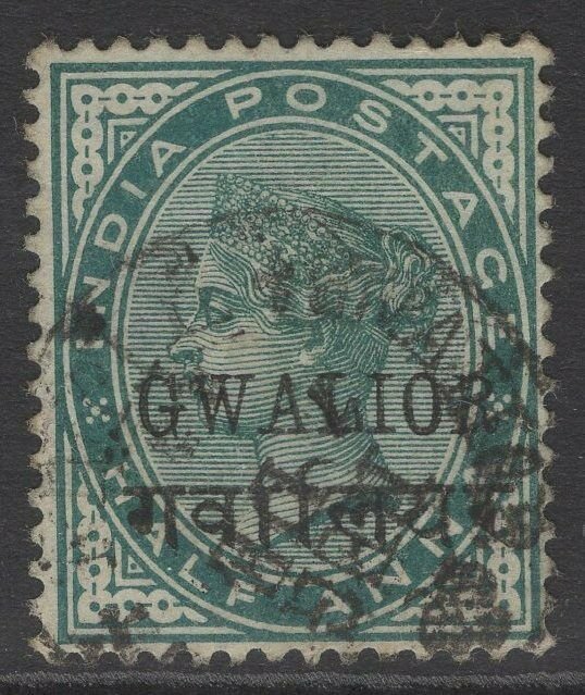 INDIA-GWALIOR SG16c 1889 ½a BLUE-GREEN INSCR 15-15½mm LONG USED