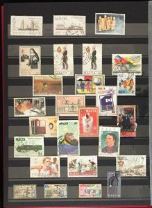 COLLECTION OF MALTA STAMPS FROM CLASSIC TO MODERN IN AN ALBUM - 300 STAMPS