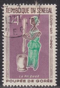 Senegal 264  Woman Pounding Grain 1966
