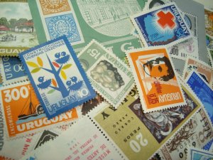 Big lot of Uruguay 1970ies MLH stamps high catalogue value very complete period 