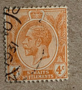 Straits Settlements 1929 KGV 4c orange, used. Scott 185, CV $0.25. SG 224