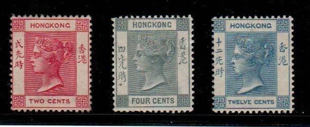 Hong Kong - Scott 36b,38,46 Mint hinged (Catalog Value $127.00)