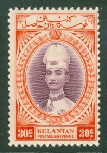 SG 49 Kelantan 1937-40. 30c violet & scarlet. Lightly mounted mint CAT £65