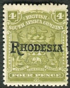 RHODESIA-1909-12 4d Olive NO STOP variety.  A mounted mint example Sg 105a