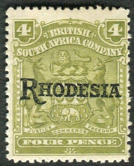 RHODESIA-1909-12 4d Olive NO STOP variety.  A mounted mint example Sg 105a