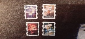 US Scott # 3462-3465; Four used (34c) Flower from 2000; VF/XF centering; off pap