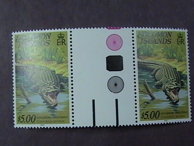 SOLOMON ISLANDS # 412 -MINT/NEVER HINGED------CROSS GUTTER PAIR-------1982