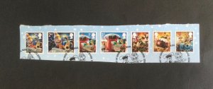 GB 2010.  Christmas Wallace & Gromit. Ex FDC on paper. Used set of 7 stamps.
