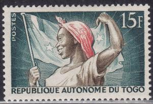 Togo 332 Woman Holding Flag 1957