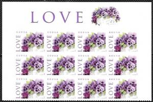 US #4450  LOVE. Pansies in a Basket.  Partial sheet of 12 with top panel.