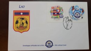 O) 2004 LAOS,  FIFA, SOCCER PLAYERS, SURROUNDING SALVAGE, ODD SHAPE, XF