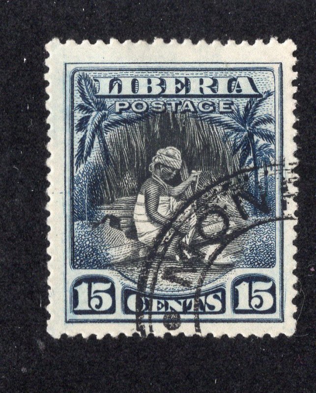 Liberia 1909 15c indigo & black Vai Woman, Scott 119 used, value = 60c