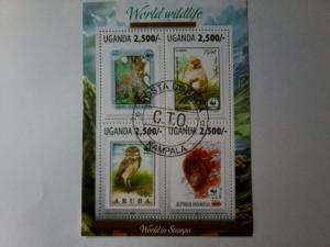 UGANDA SHEET USED WILDLIFE OWLS PRIMATES WILD CATS BIRDS