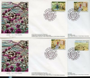 UN WFUNA 1986 DEVELOPMENT PROGRAM NY SET ON FOUR  FDCs CACHET DESIGN BY XING FEI