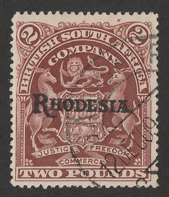 RHODESIA : 1909 RHODESIA on Arms £2 brown. 