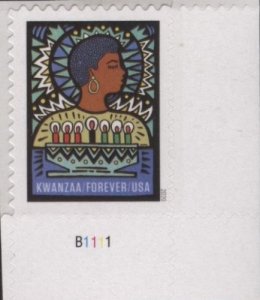 US 5530 (mnh, w/plate #) (55¢) Kwanzaa (2020)