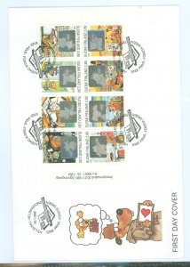 Finland 948-956 1995 Dog Hill Kids Kunnas Hologram booklet of eight stamps on an unaddressed, cacheted FDC