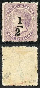 Turks and Caicos SG12 1/2 on 1/- lilac Mint no gum Cat 275 pounds