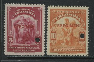 Columbia 2 stamps overprinted SPECIMEN in red mint o.g.