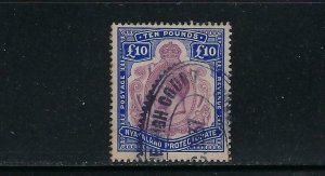 NYASALAND SCOTT #24 1913-19 GEORGE V WMK 3- TEN POUNDS- REVENUE CANCEL