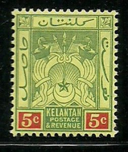 Album Treasures Malaya Kelantan Scott # 4  5c Symbols of Government MH