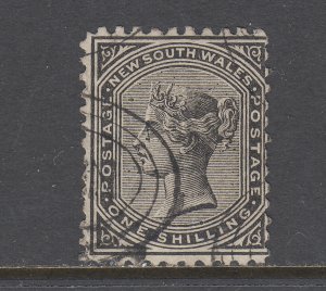 New South Wales SG 237d used. 1885 1sh black QV, perf 11x12, inverted watermark