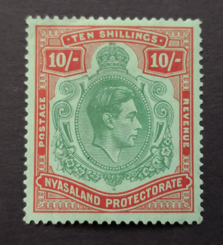 1938-44 nyasaland KGVI 10/ issue MH sc#66 cv 35.00