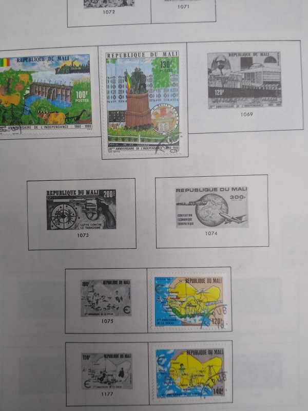 collection on pages Mali 1977-83 scattered most CTO PS: CV $103