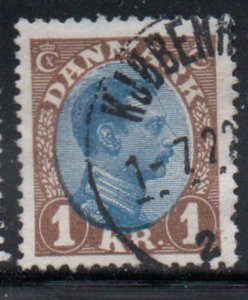 Denmark Sc 128 1928 1 kr brown & blue Christian X  stamp used