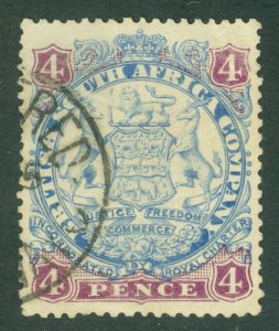 SG 32 Rhodesia 1896-97. 4d ultramarine & mauve. Very fine used