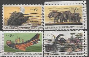 United  States #1387 - 1390 Eagle, Elephants, Dinosaurs, Canoe.