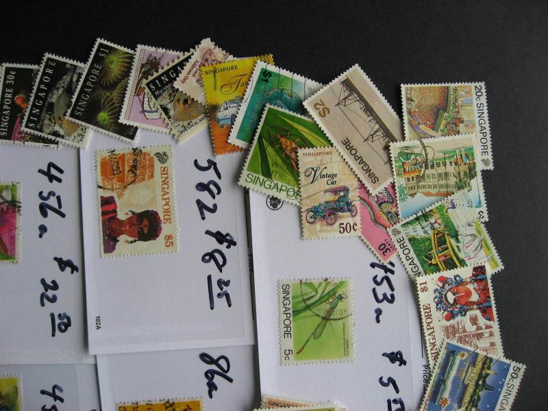 Singapore 50 different stamps plus $100 catalogue value of high values too!