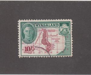 NYASALAND (MK2491)  #80  USED 10sh  MAP AND COAT OF ARMS GRN/LAKE CAT VALUE $18