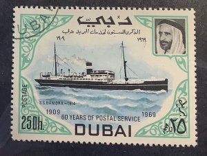 Dubai 1969 Scott 90  used - 25d, 60 years of Postal service, ships,  S.S. Bamora