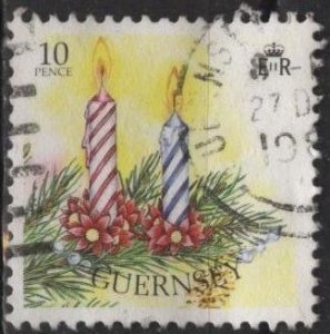 Guernsey 421c (used) 10p Christmas, candles (1989)