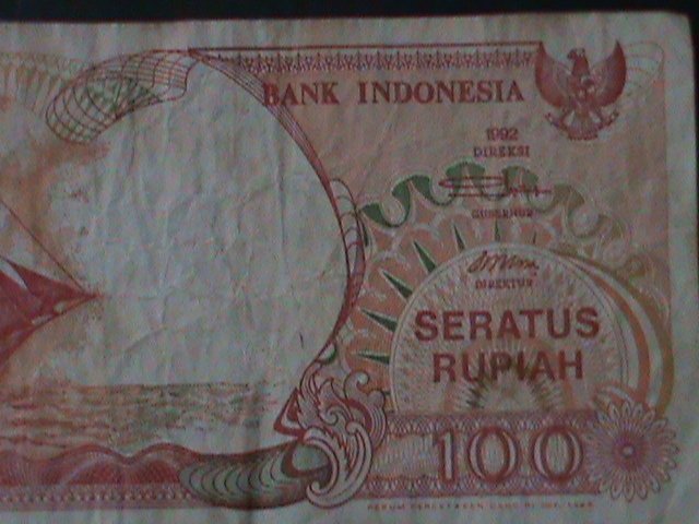 ​INDONESIA-1992-BANK INDONESIA-$100 RUPIAH- CIRCULATED-VF-32YEARS OLD