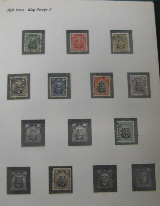 RHODESIA 1924-1977, in Tudor Hingeless album, used & mint, Scott $620.00